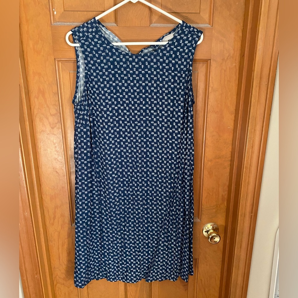 Woman within sleeveless shift dress